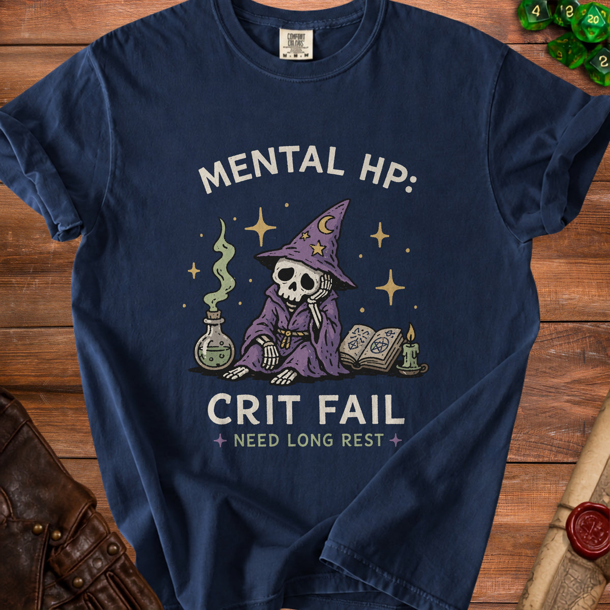 Navy t-shirt with skeleton wizard graphic, "MENTAL HP: CRIT FAIL NEED LONG REST".
