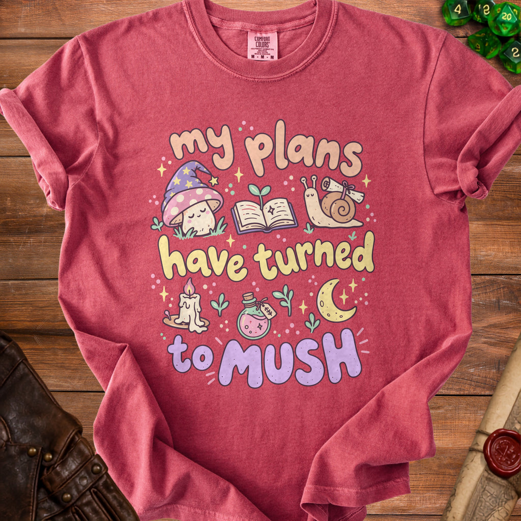 Red shirt with text "my plans have turned to mush" and cartoon mushroom, book, and snail.