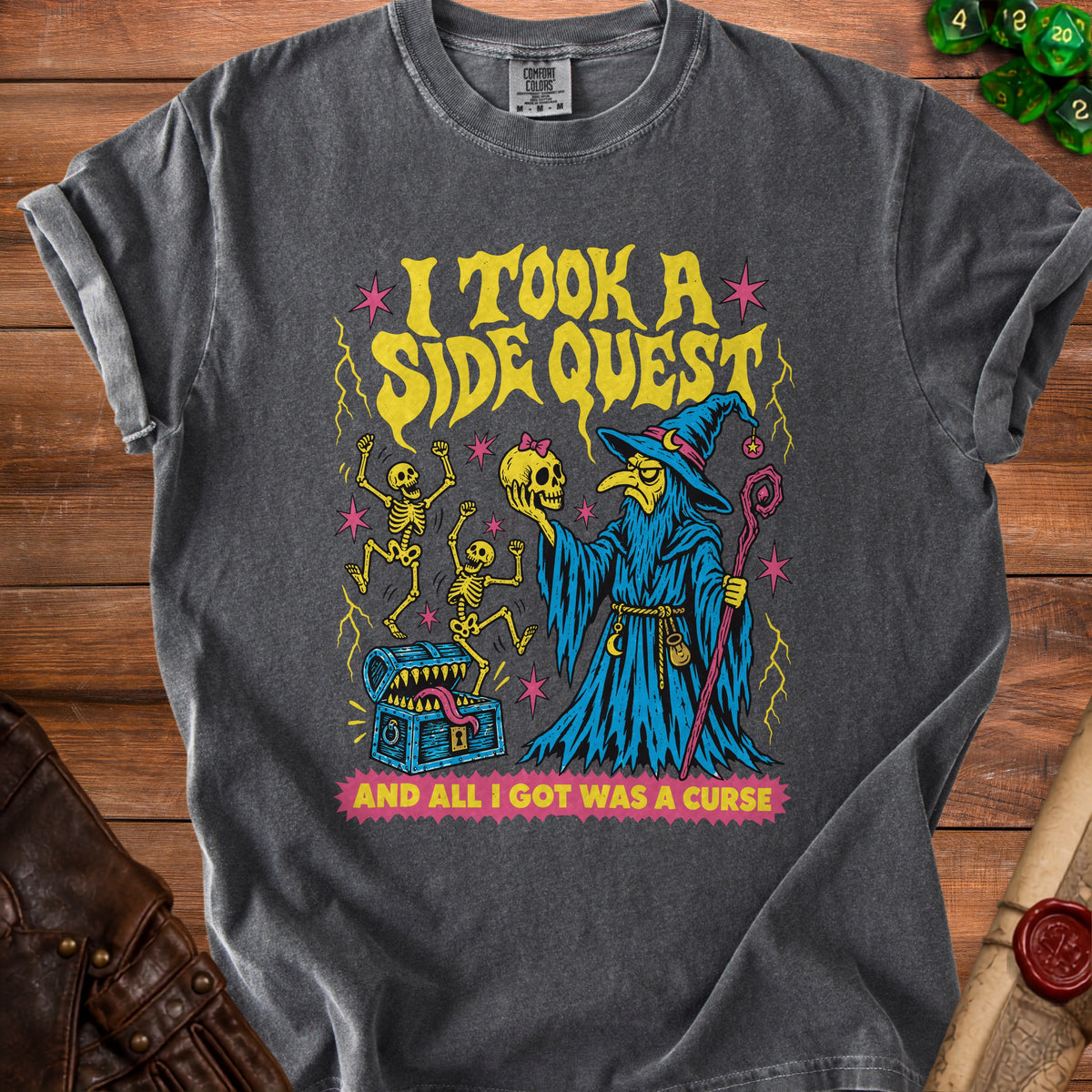 T-shirt with wizard, skeletons, treasure chest, and text: "I took a side quest and all I got was a curse."