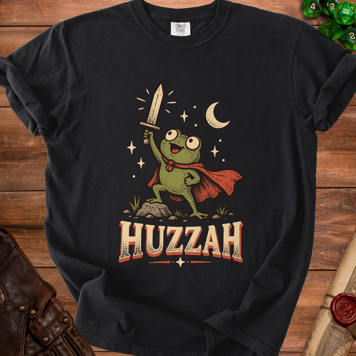 Frog knight with sword and cape, "HUZZAH" text, moon and stars.