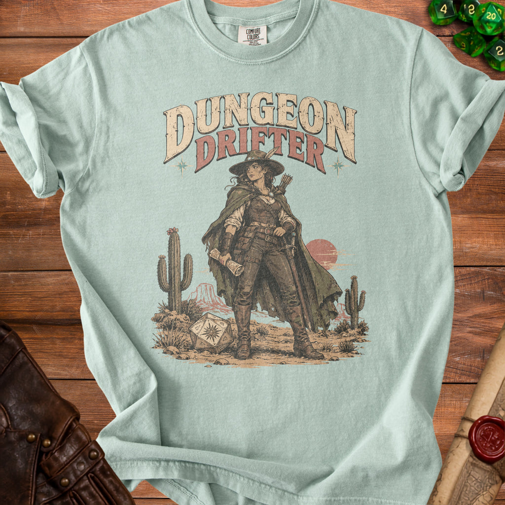 Mint t-shirt with "Dungeon Drifter" text and desert scene art.