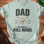 Light blue t-shirt with "DAD Certified ROLL MODEL" text and D20 dice design.