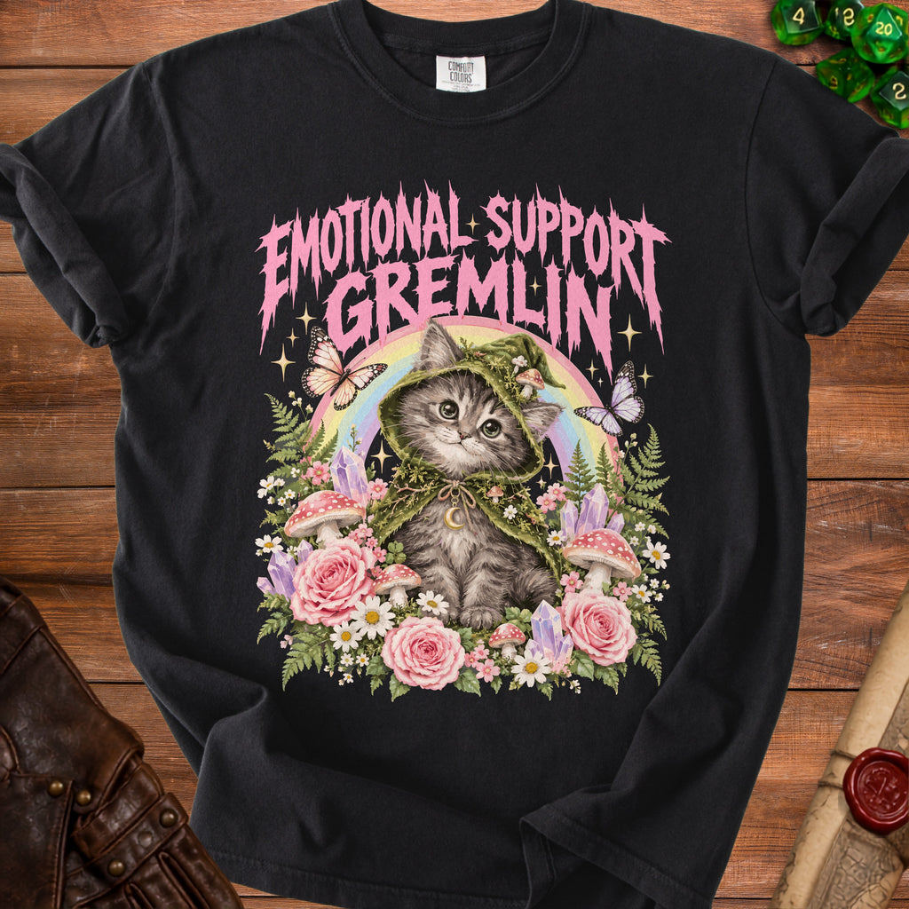 Black t-shirt with "Emotional Support Gremlin" text over a cat wearing a mushroom hat and surrounded by flowers.