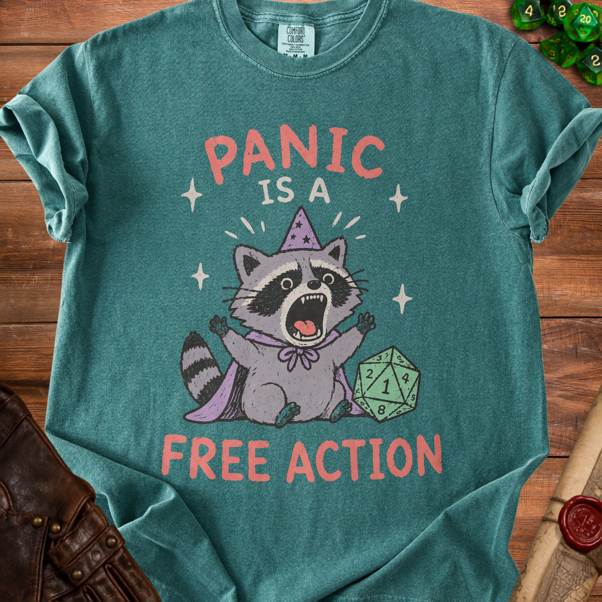 T-shirt with panicked raccoon wearing wizard hat and text "Panic is a free action".