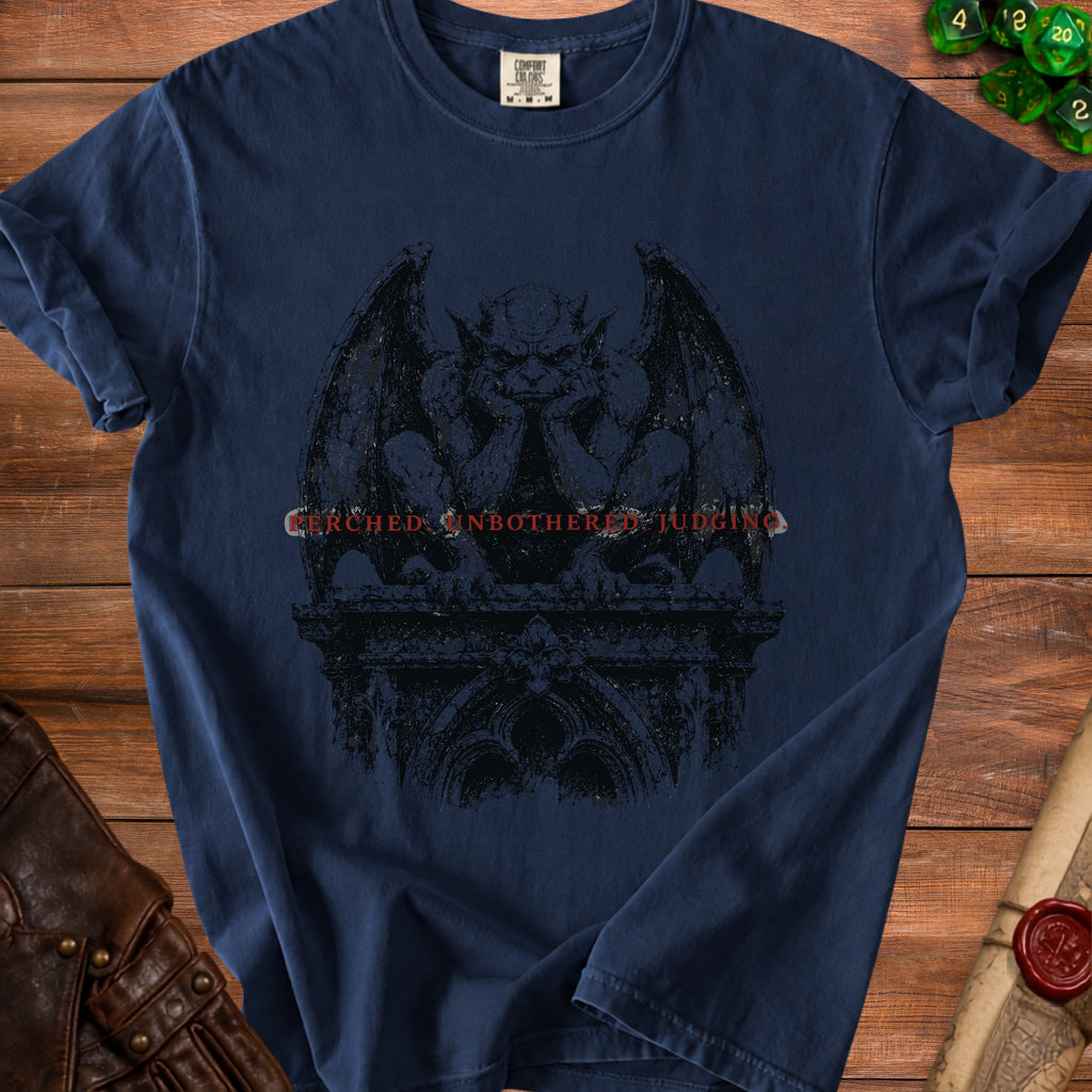 Navy t-shirt with a dark gargoyle and text "PERCHED UNBOTHERED JUDGING."
