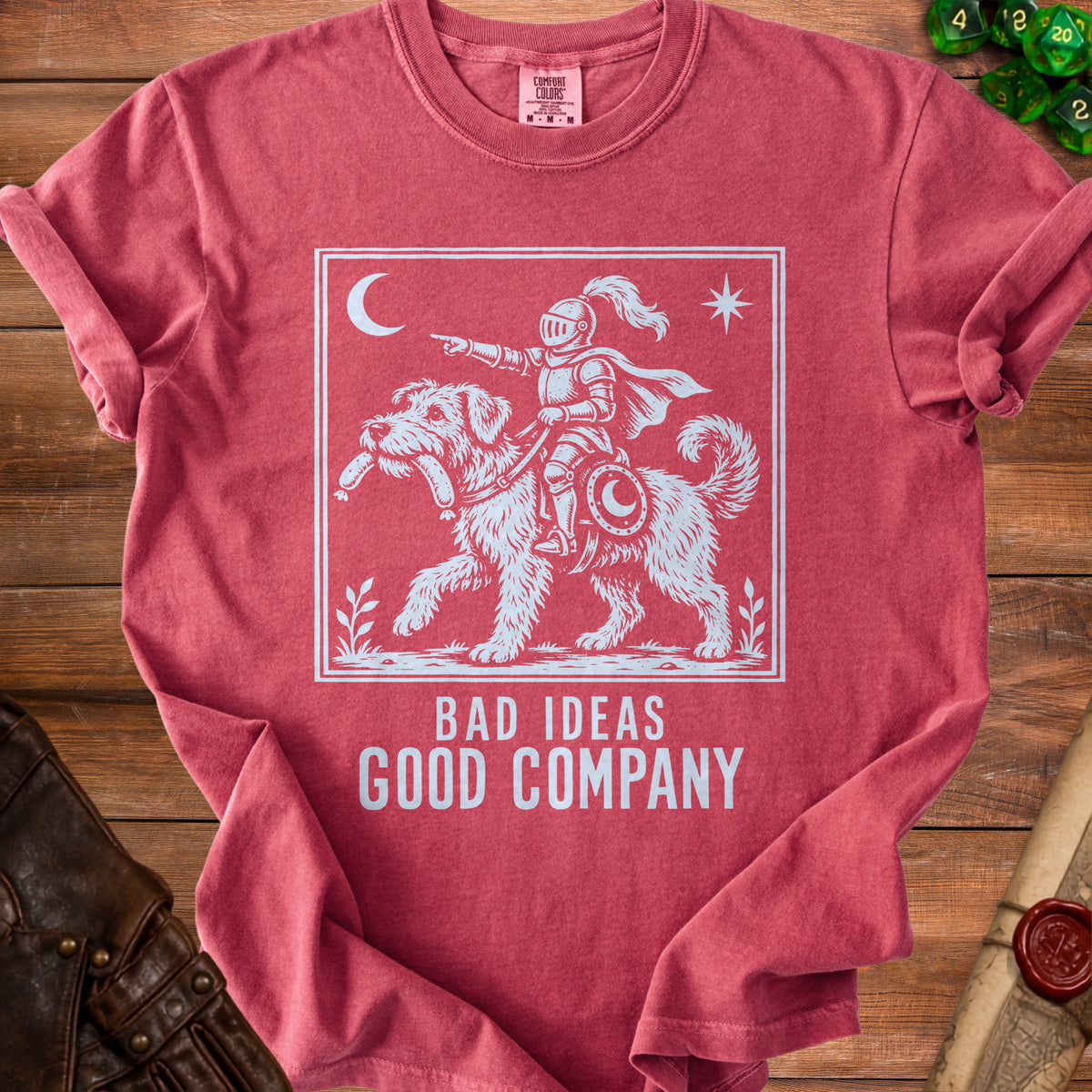 T-shirt with knight riding a dog, text "BAD IDEAS GOOD COMPANY".