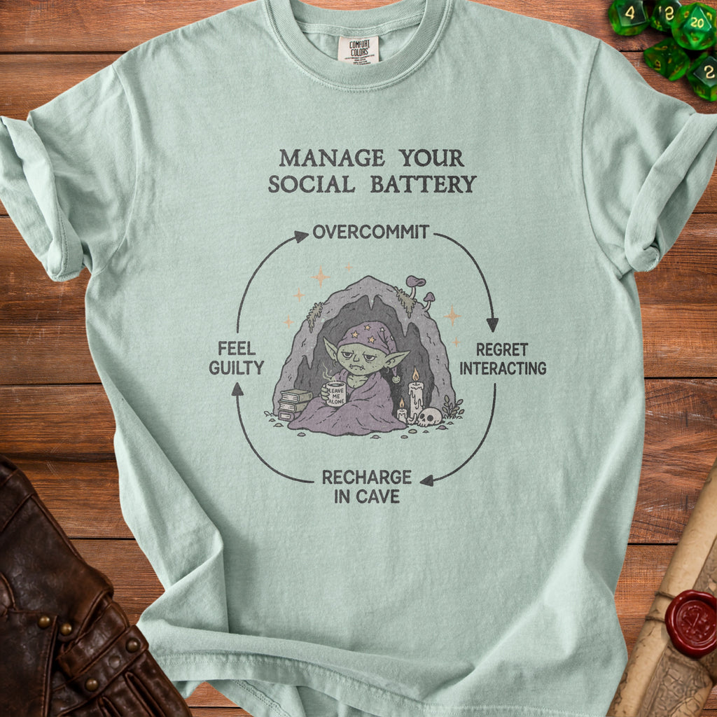 T-shirt graphic showing a cycle of social battery management with text and illustrations.