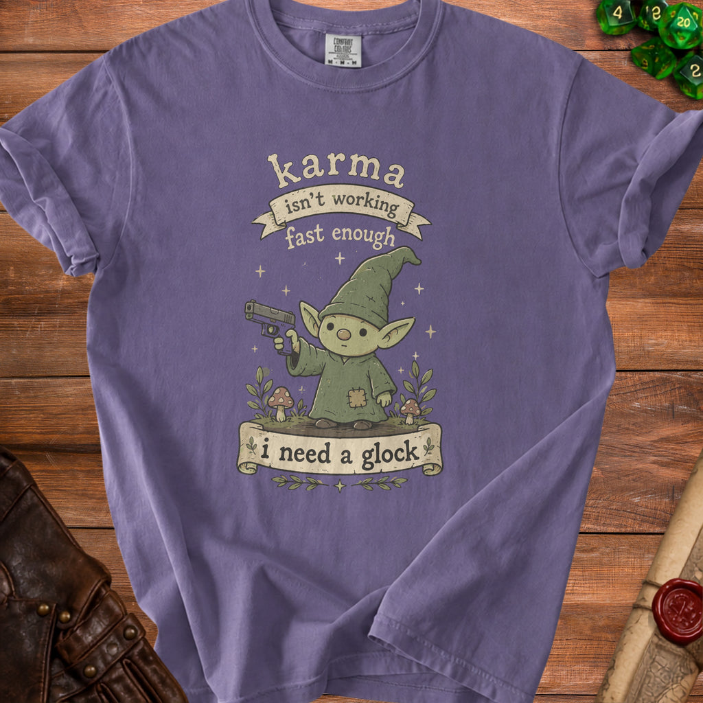 Purple t-shirt with gnome graphic: "karma isn't working fast enough i need a glock".