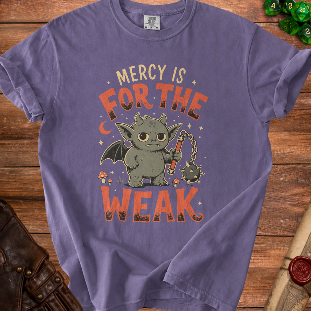 Purple t-shirt with a cartoon gargoyle and text "Mercy is for the weak".