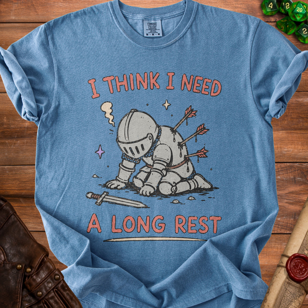 Blue t-shirt with cartoon knight and text "I THINK I NEED A LONG REST".