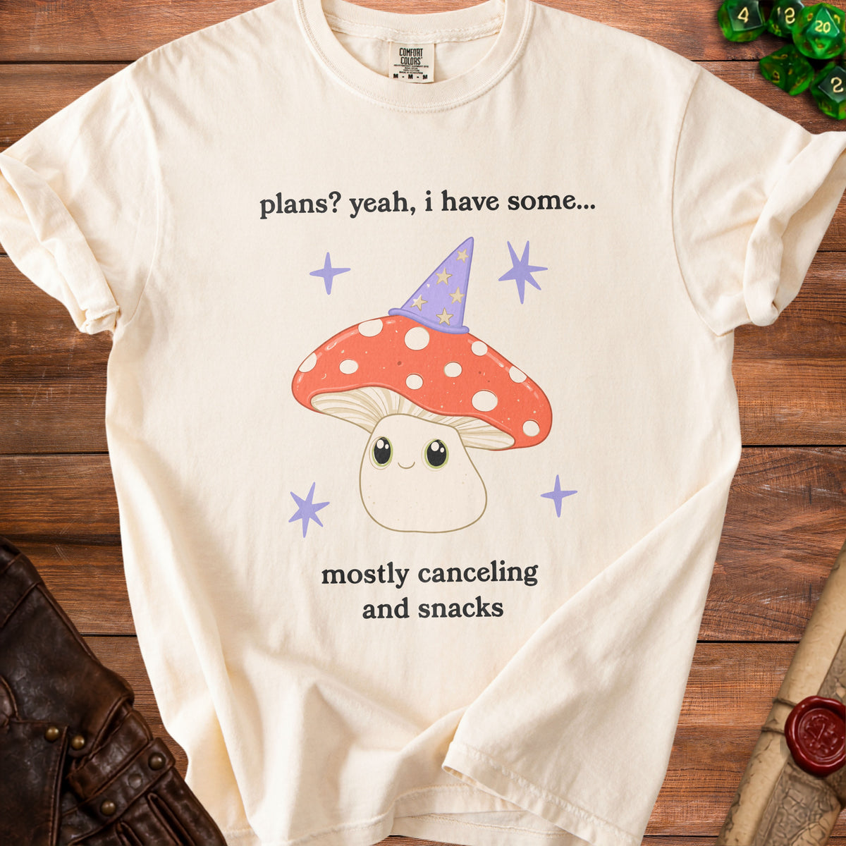 Cream t-shirt with a mushroom wearing a wizard hat and text.