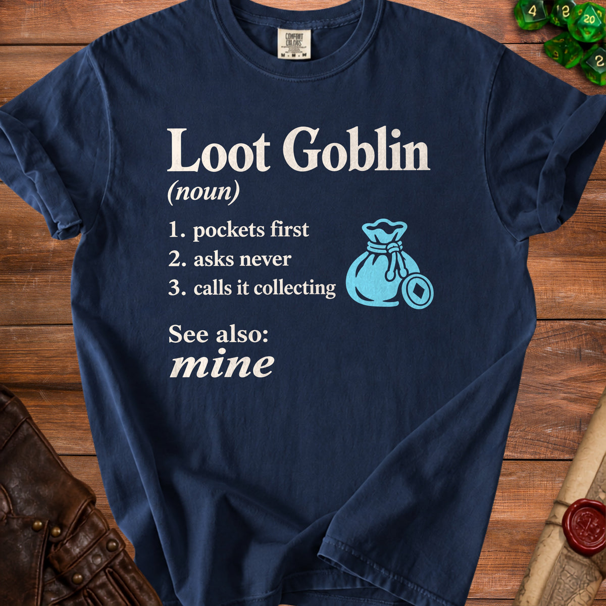 Navy t-shirt with "Loot Goblin (noun)" and definition, and a money bag icon.