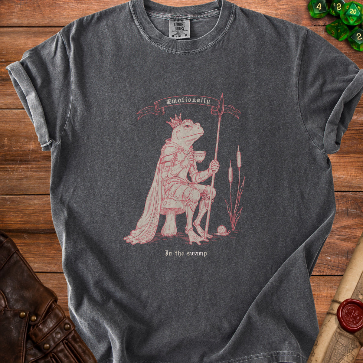 Dark grey t-shirt with king frog graphic and text "Emotionally In the swamp".