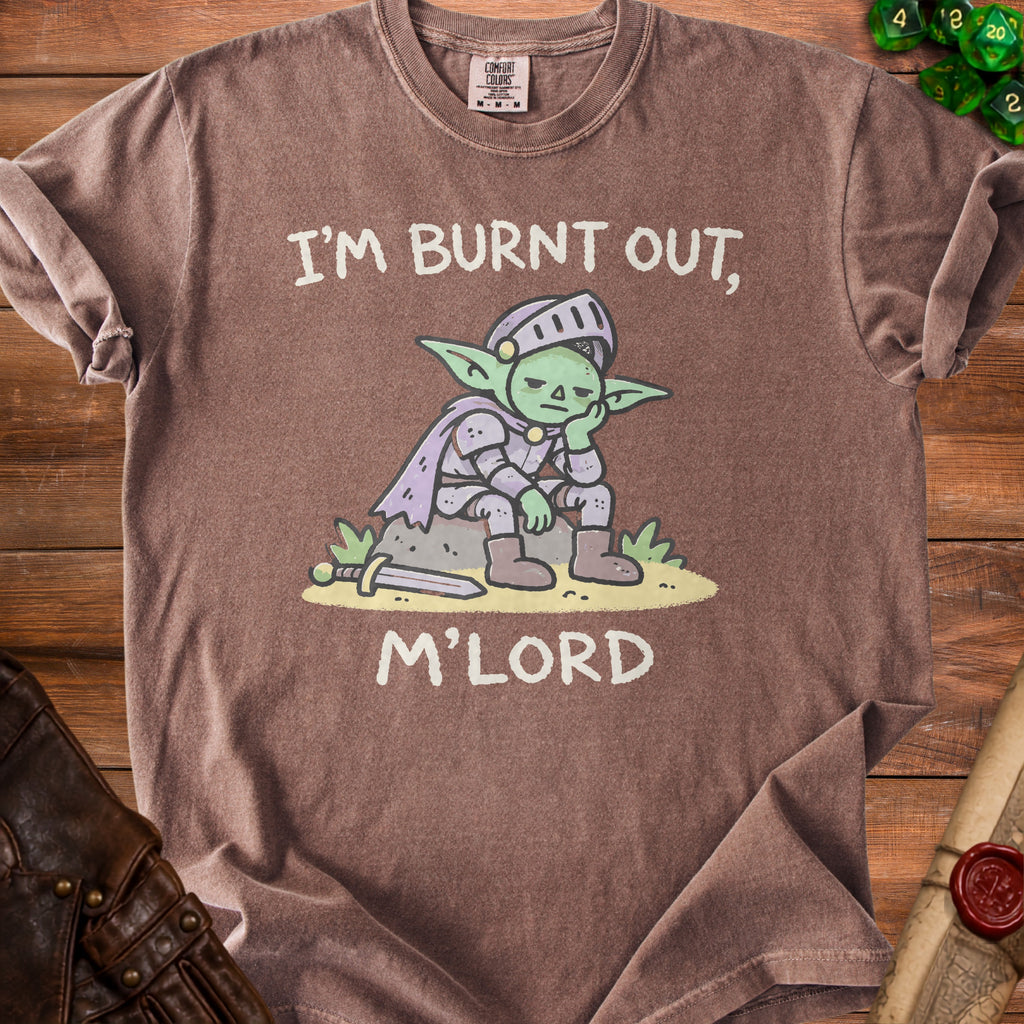 Brown t-shirt with cartoon goblin knight saying "I'M BURNT OUT, M'LORD".