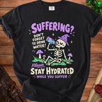 Skeleton wearing a witch hat drinks from a bottle, text says "Suffering? Don't forget to drink water!"