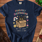 Navy t-shirt with a black cat in a box graphic and "Probably Overthinking But At Least I Have A Box" text.