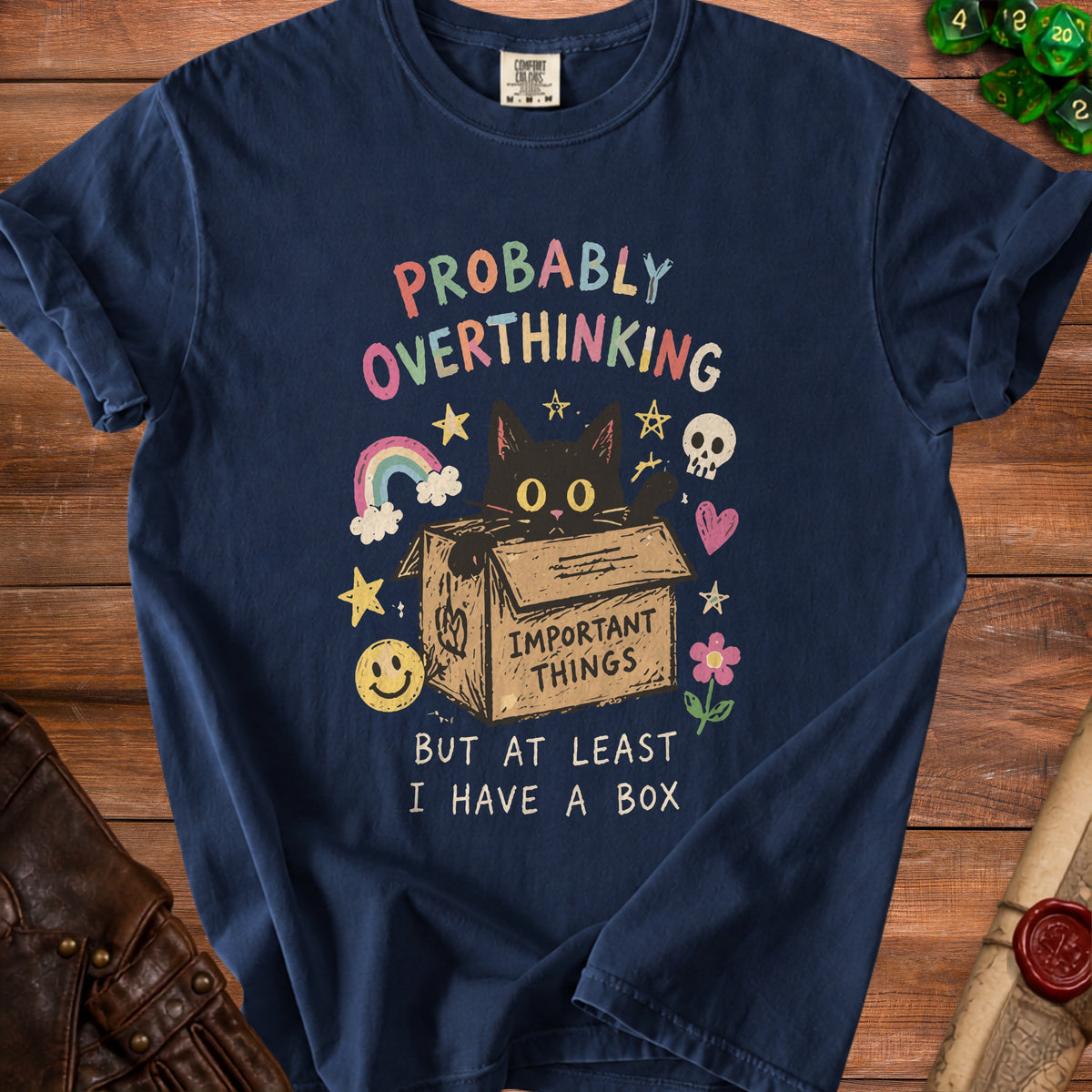 Navy t-shirt with a black cat in a box graphic and "Probably Overthinking But At Least I Have A Box" text.
