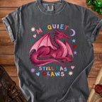 Dark grey t-shirt with a pink dragon graphic and text "MY QUIET STILL HAS CLAWS".