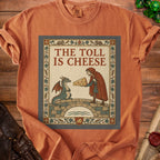 T-shirt graphic with dragon and man on bridge, text "THE TOLL IS CHEESE".