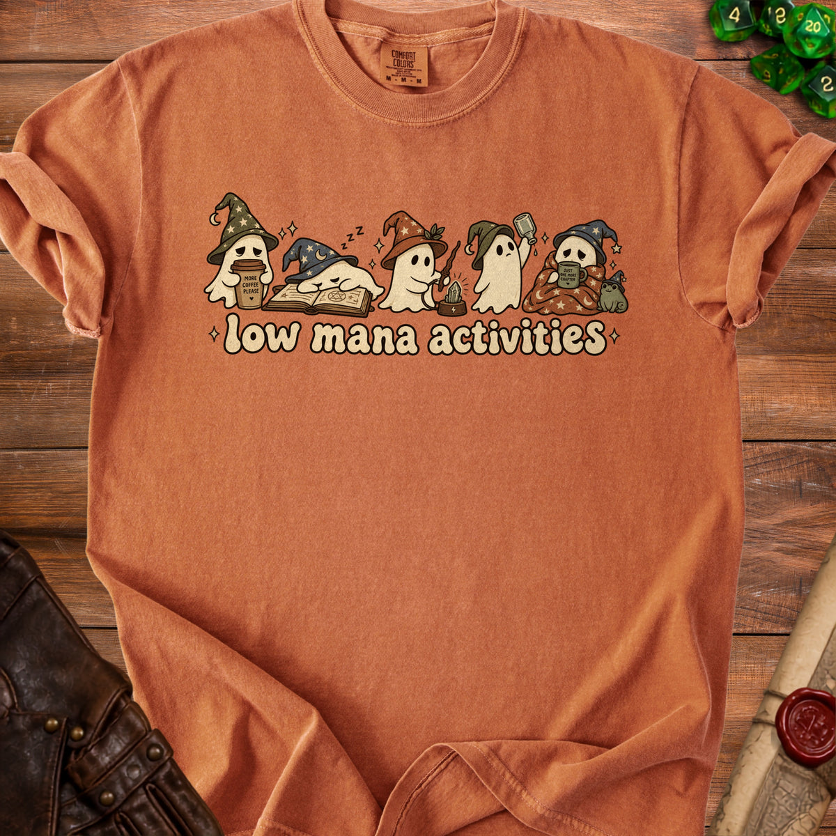 Orange t-shirt with ghosts and "low mana activities" text.