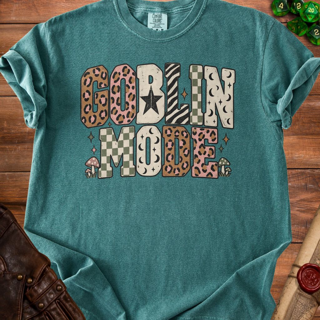 Teal t-shirt with "GOBLIN MODE" text and patterned letters.
