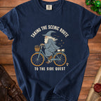 T-shirt graphic of wizard riding bicycle with text "Taking the Scenic Route to the Side Quest".
