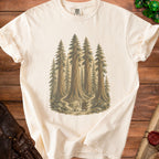 Cream t-shirt with a forest scene featuring a wizard and a hobgoblin.