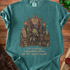 Green t-shirt with goblin art and text: "Everything is my responsibility", "I'm a strong independent woman, but like, against my will."