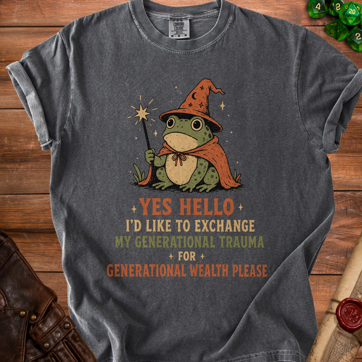 T-shirt with wizard frog graphic and text "Yes hello I'd like to exchange my generational trauma for generational wealth please".