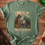 Green t-shirt with MILF Man I Love Forests graphic of a wizard in a forest.