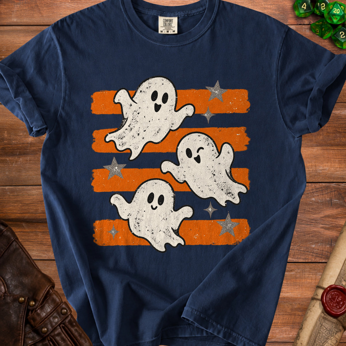 Navy t-shirt with three distressed white ghosts and orange stripes.