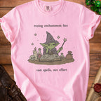 Pink t-shirt with a grumpy wizard graphic and text "resting enchantment face" and "cast spells, not effort".