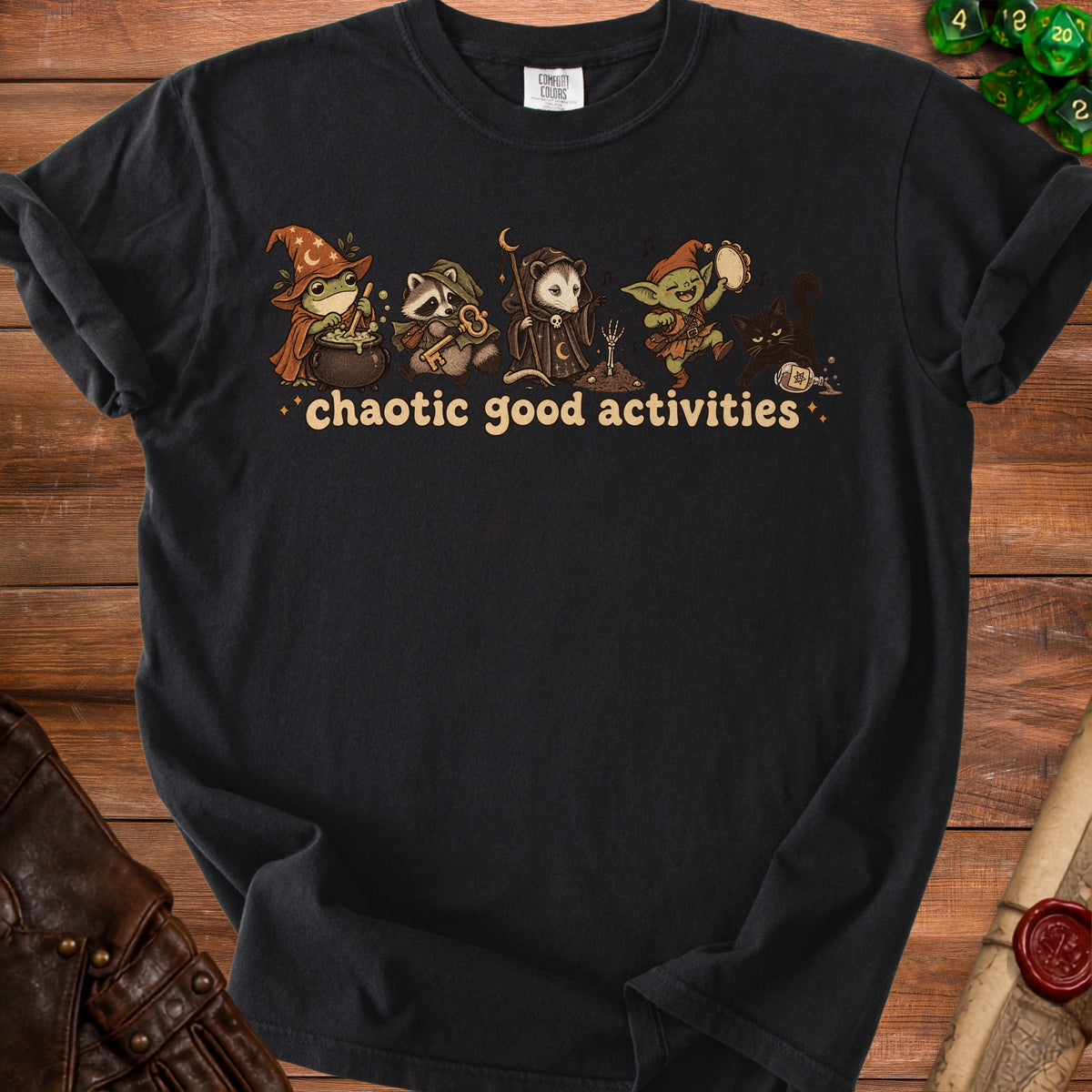 Black t-shirt with "chaotic good activities" text and cartoon fantasy creatures.