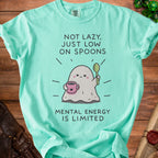 Teal t-shirt with ghost graphic and text "Not lazy, just low on spoons. Mental energy is limited."