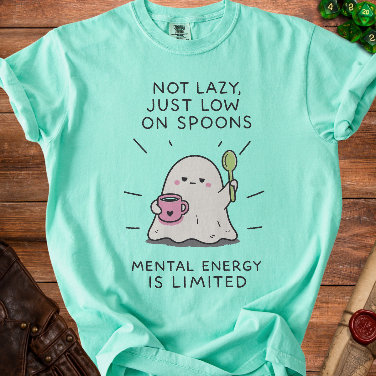 Teal t-shirt with ghost graphic and text "Not lazy, just low on spoons. Mental energy is limited."