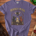 T-shirt with purple color and occult cat graphic reading "Mentally I'm Here."