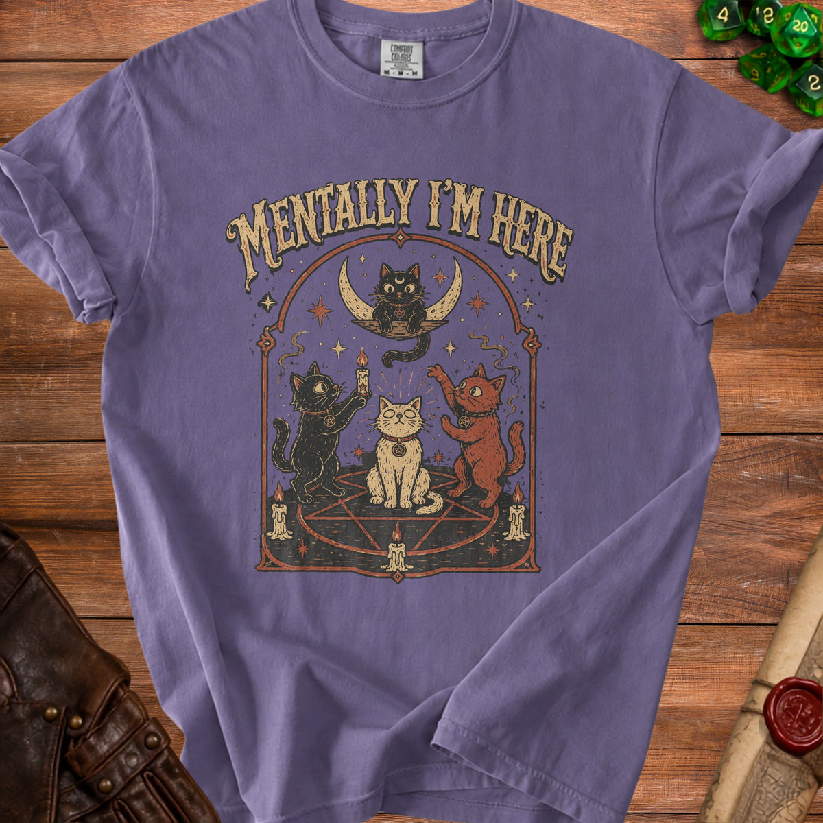 T-shirt with purple color and occult cat graphic reading "Mentally I'm Here."