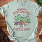 Green t-shirt with cartoon cat and dice, reads "Easily Distracted By Cats & Dice".