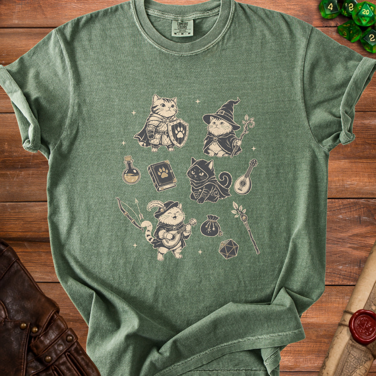 Green t-shirt with four fantasy cat illustrations: warrior, wizard, rogue, and bard.