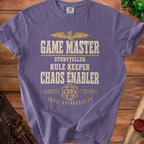 Purple t-shirt with "Game Master Storyteller Rule Keeper Chaos Enabler" text.
