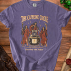 T-shirt with "The Caffeine Circle Restore the Party" text and three witches.