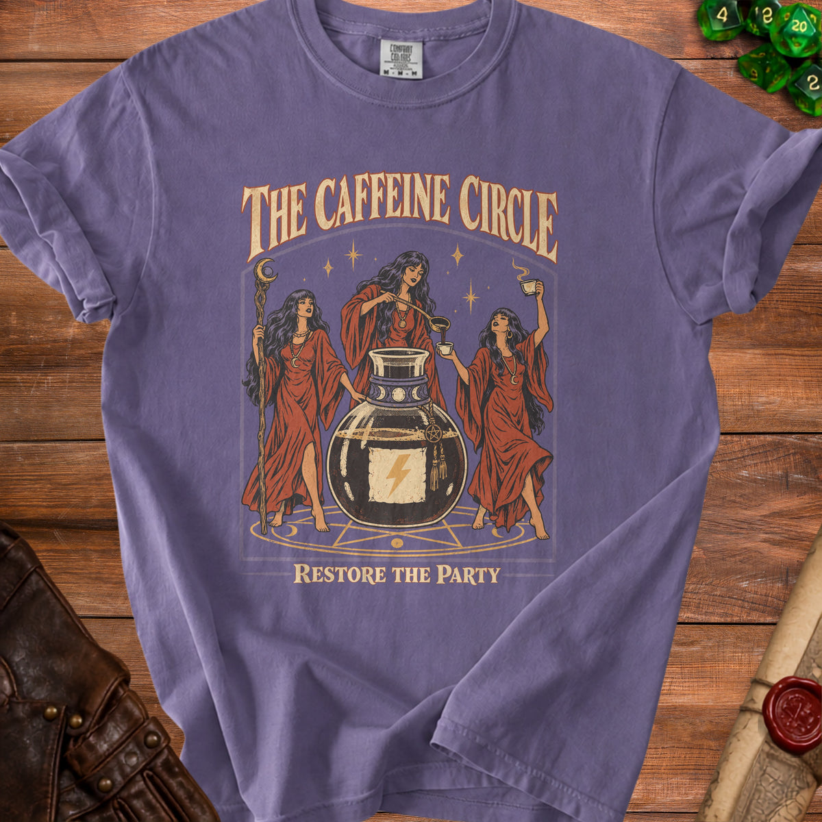 T-shirt with "The Caffeine Circle Restore the Party" text and three witches.