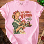 Pink t-shirt with retro illustration of woman serving mushrooms to frog king.
