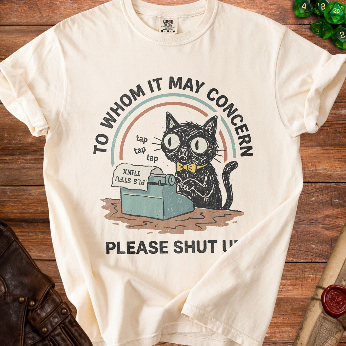 Black cat wearing bow tie typing on typewriter, with text "TO WHOM IT MAY CONCERN" and "PLEASE SHUT UP".