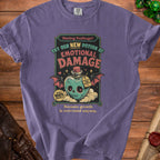Purple t-shirt with "Emotional Damage" potion graphic and quote "Because growth is overrated anyway."