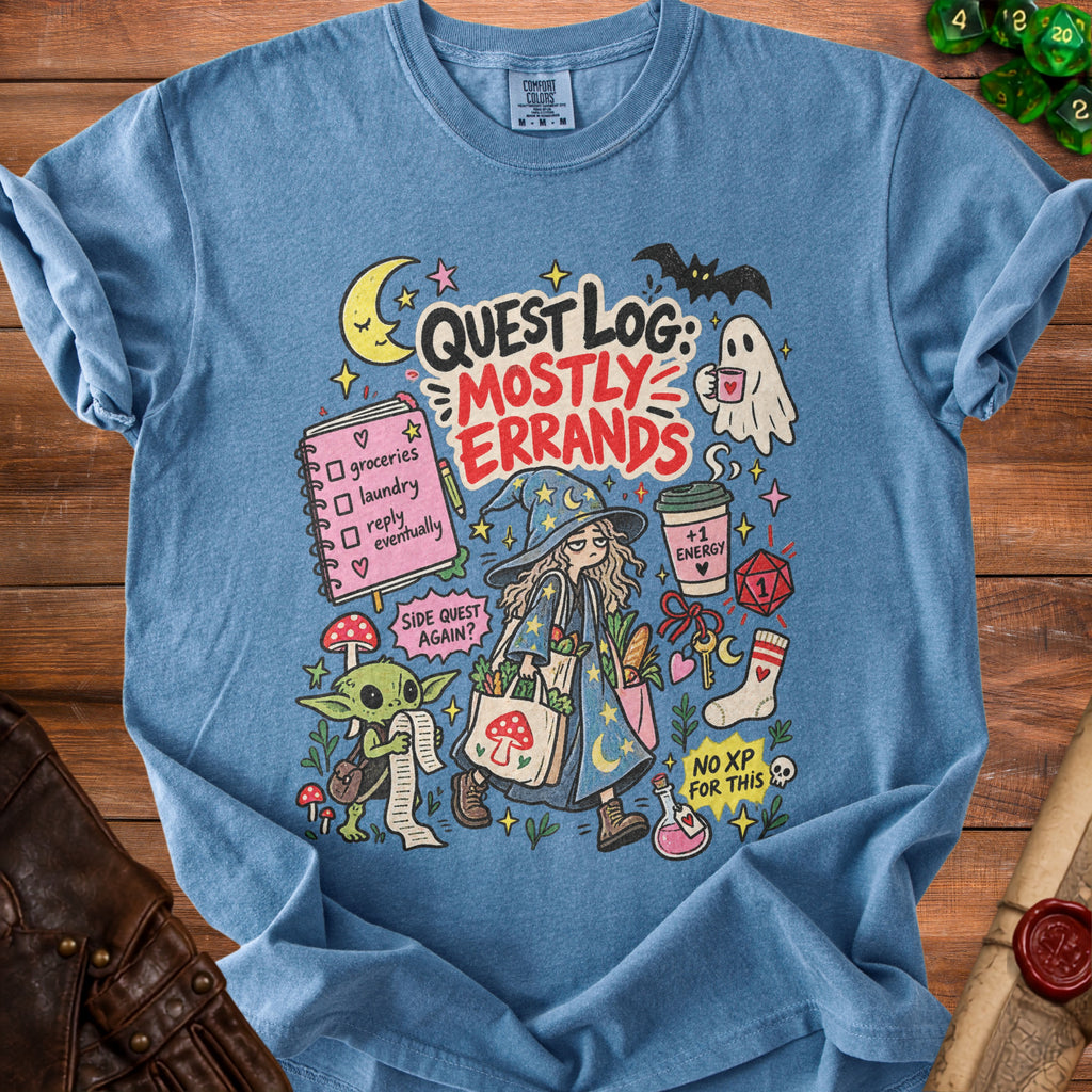 Blue t-shirt with "Quest Log: Mostly Errands" graphic featuring a witch, goblin, and ghost.