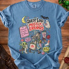 Blue t-shirt with "Quest Log: Mostly Errands" graphic featuring a witch, goblin, and ghost.