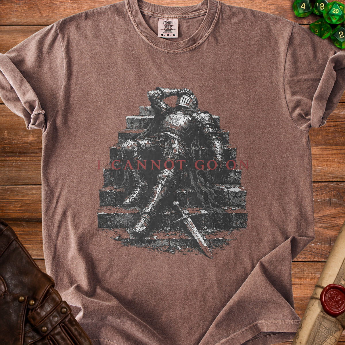 Brown t-shirt with a knight on stairs graphic and text "I CANNOT GO ON".