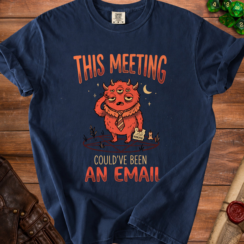T-shirt with a tired red monster holding an agenda that says "This meeting could've been an email".