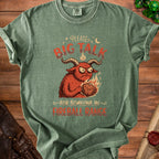 Green t-shirt with a distressed print of a red, horned creature holding a D20 die, saying "Please Big Talk For Someone In Fireball Range".